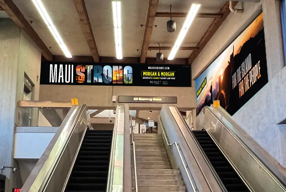 Outbound area of Maui Airport with Morgan & Morgan ads