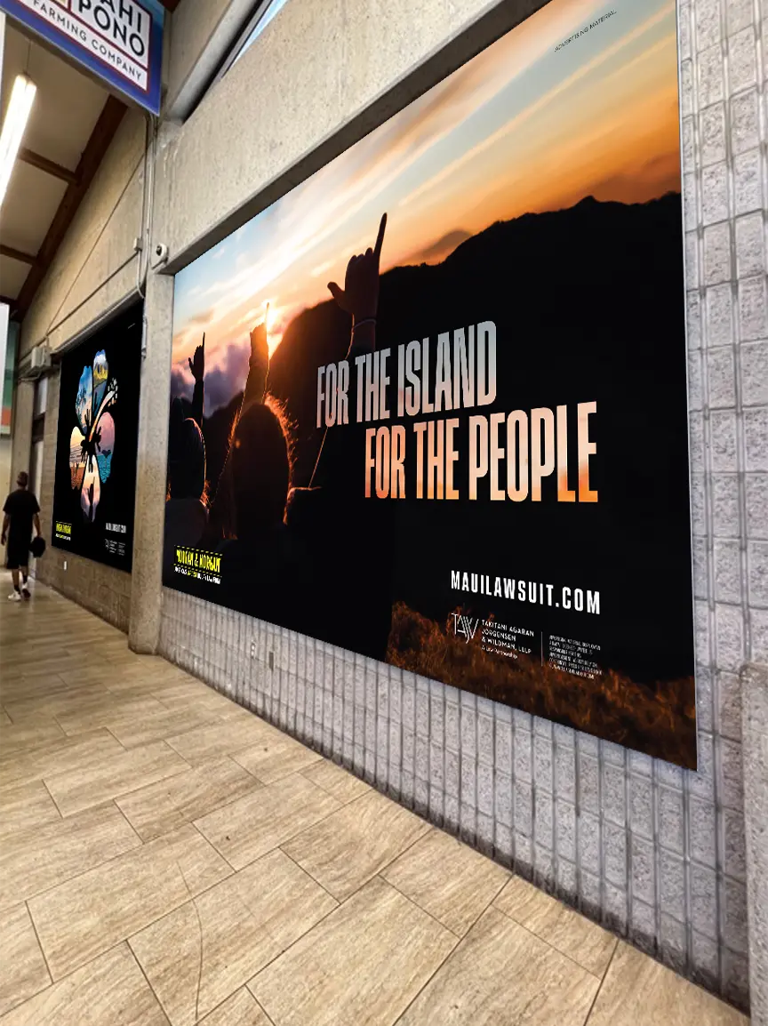 Wall area of Maui Airport with Morgan & Morgan ads